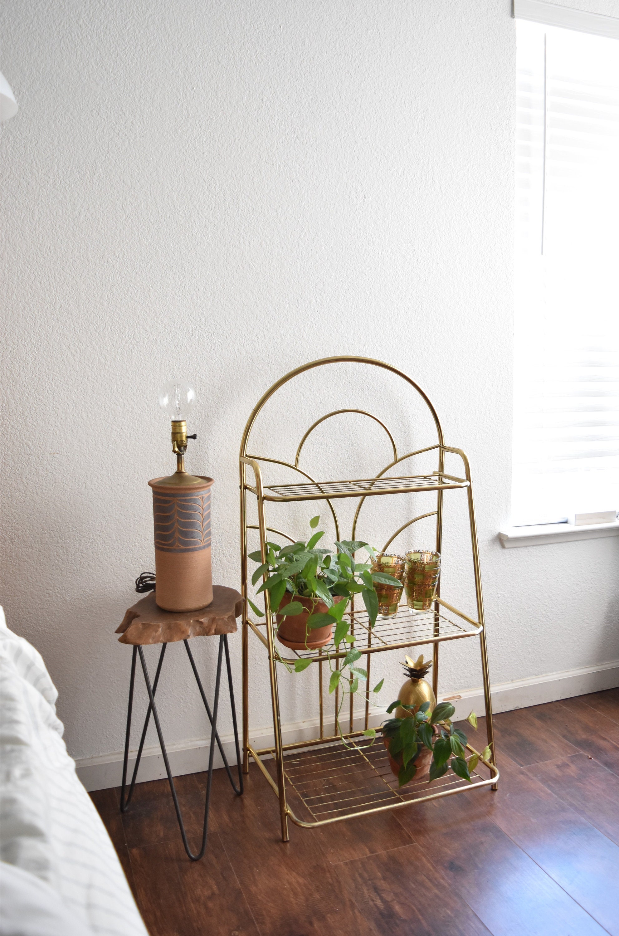 mid century modern gold tone magazine file plant stand