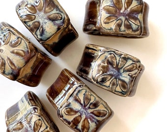 hand thrown artisan studio pottery napkin ring holder set | brown glazed