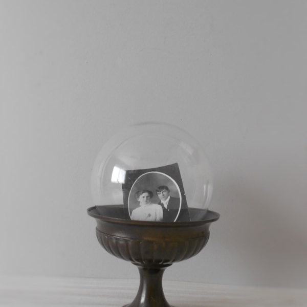 glass ball cloche with metal pedestal base / snow globe