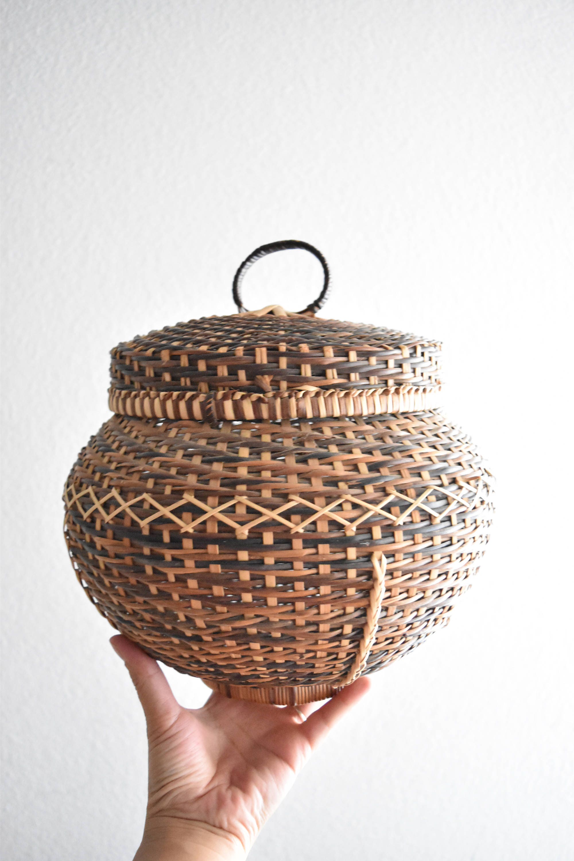 woven rattan orb basket with lid / snake charmer basket