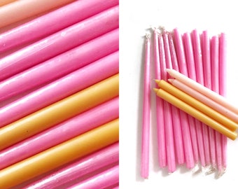 box set of super long vintage bright neon pink wax candle | candlesticks