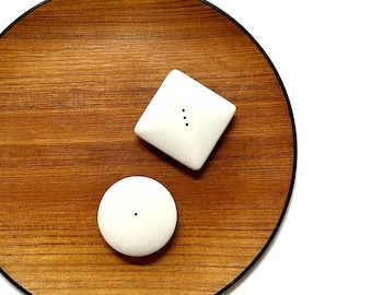 modern geometric shaped white ceramic salt and pepper shaker set