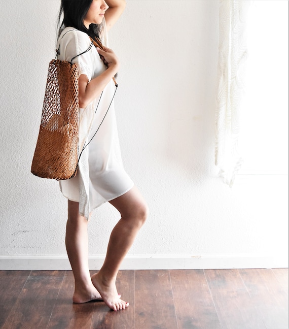 woven rattan bamboo traveling drawstring backpack 