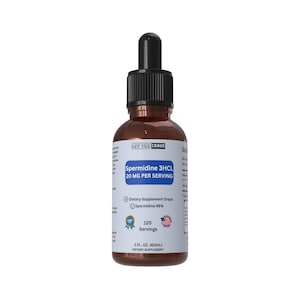 May include: A brown glass bottle with a black dropper top, labeled "Spermidine 3HCL 20 MG PER SERVING." The bottle contains dietary supplement drops, with 120 servings and 2 fl. oz. (60mL).