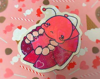 Sticker vinyle holographique rose isopode