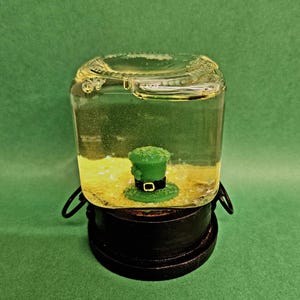Leprechaun Jarhead (Handmade snow globe containing a green top hat and lucky sparkles)