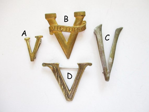 V brooch discount