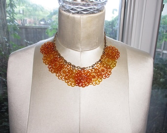 Vintage Celluloid Flower Bib Necklace Translucent Amber Orange Brass Chain Art Deco Statement