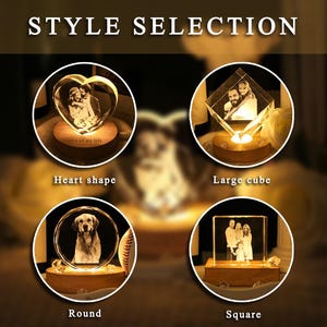 May include: A collection of four illuminated crystal displays labeled STYLE SELECTION. The shapes include a heart, a large cube, a round disc, and a square block, each featuring an engraved photograph and resting on a circular wooden base.