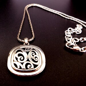 May include: A set of three ceramic mugs with a speckled, matte finish. The mugs are in shades of cream, light gray, and dark gray. Each mug has a simple, minimalist design, perfect for coffee or tea.