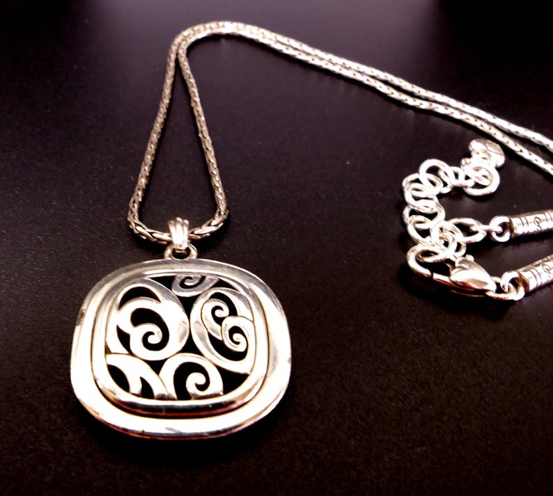 May include: A set of three ceramic mugs with a speckled, matte finish. The mugs are in shades of cream, light gray, and dark gray. Each mug has a simple, minimalist design, perfect for coffee or tea.