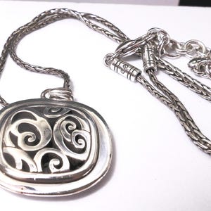 May include: A set of three ceramic mugs with a speckled, matte finish. The mugs are in shades of cream, light gray, and dark gray. Each mug has a simple, minimalist design, perfect for coffee or tea.