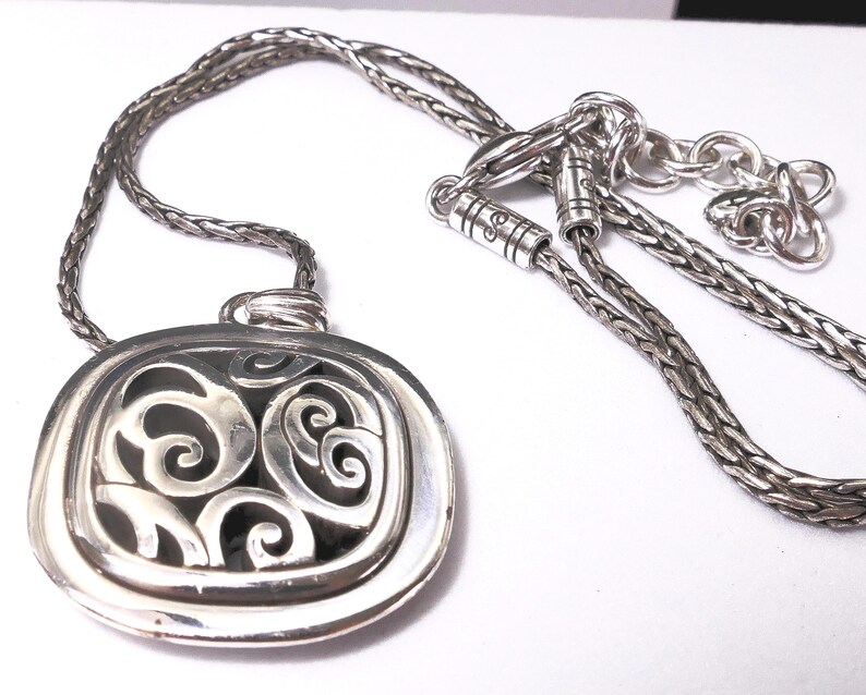 May include: A set of three ceramic mugs with a speckled, matte finish. The mugs are in shades of cream, light gray, and dark gray. Each mug has a simple, minimalist design, perfect for coffee or tea.