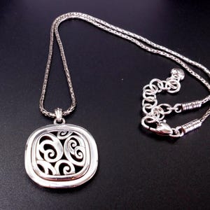 May include: A set of three ceramic mugs with a speckled, matte finish. The mugs are in shades of cream, light gray, and dark gray. Each mug has a simple, minimalist design and a rounded handle. The mugs are stacked on top of each other.