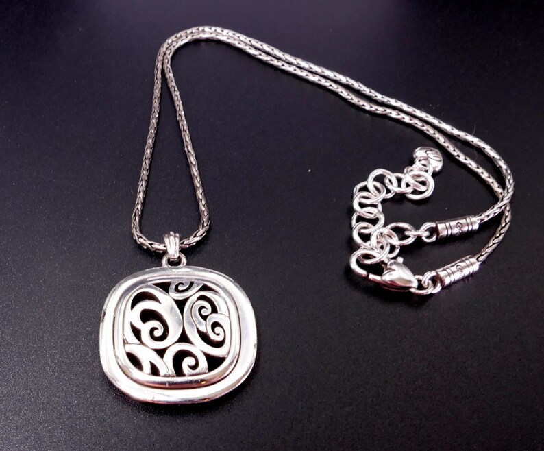 May include: A set of three ceramic mugs with a speckled, matte finish. The mugs are in shades of cream, light gray, and dark gray. Each mug has a simple, minimalist design and a rounded handle. The mugs are stacked on top of each other.