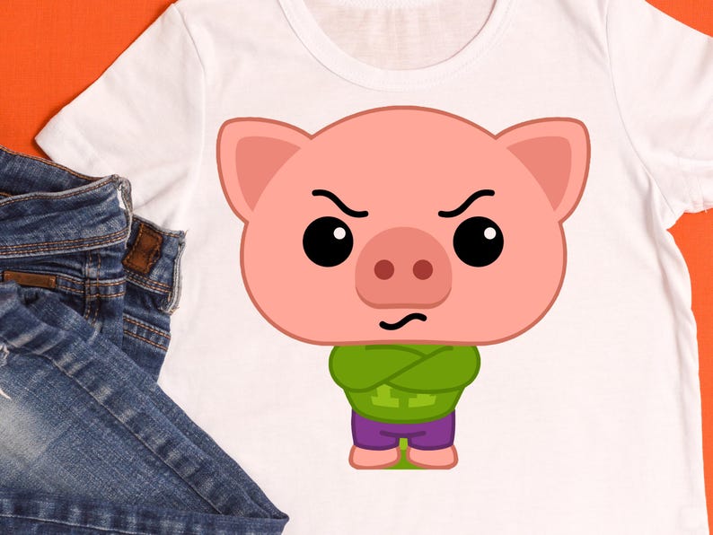 May include: White t-shirt featuring a cartoon pig with an angry expression. The pig is pink with black eyes, a green shirt, and purple shorts. The shirt is made of a soft material and is suitable for casual wear.