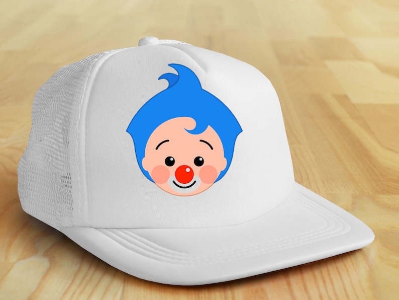 May include: White trucker hat featuring a cartoon clown face with blue hair, a red nose, and a smiling expression. The hat has a mesh back and a curved brim, suitable for sun protection.