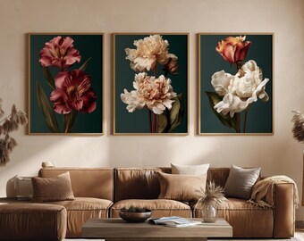 May include: A set of three framed wall art prints featuring botanical illustrations against a dark green background. The left print shows deep red flowers, the center print displays light beige peonies, and the right print depicts white and orange blooms.