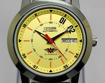 Reloj automático Citizen vintage, década de 1970, 21 joyas, esfera amarilla con marcadores naranjas, reloj mecánico para hombre.