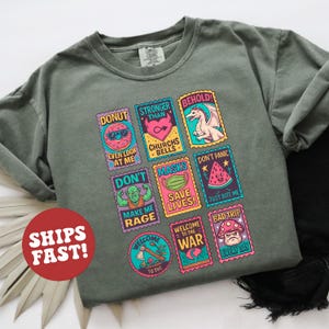 Dungeon Crawler Carl Book Stamps Comfort Colors Shirt, New Achievement TShirt, Princess Donut Mongo Tee, Booktok Fantasy Book Shirt, Sci-Fi
