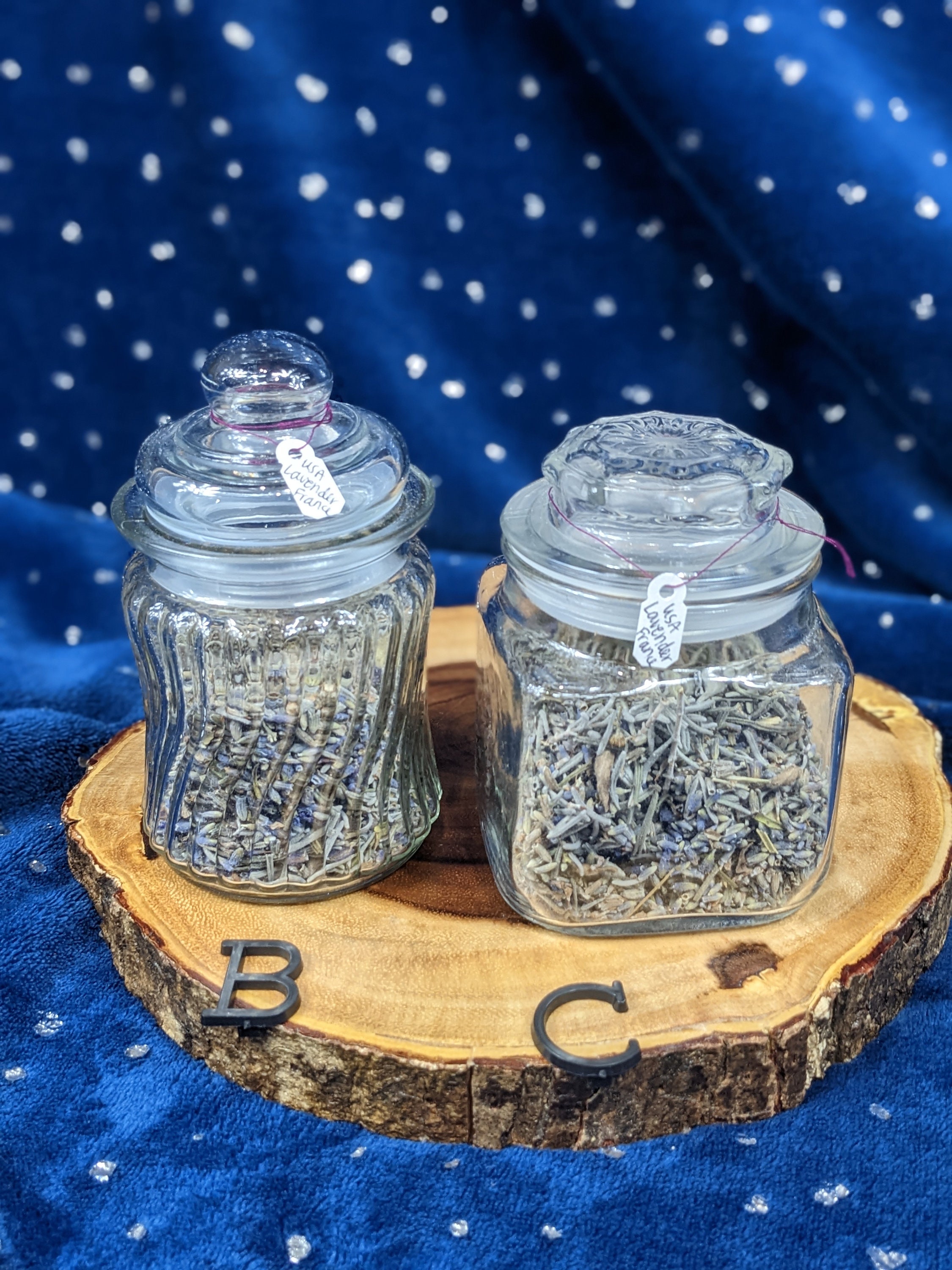 Glass jar of dry lavender flowers, sachets, bunches of dry lavender. Jars  of different dry medicinal herbs on background. Alternative medicine Stock  Photo - Alamy