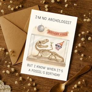 Funny Fossil Birthday Card for Him or Her – Sarcastic Old Age Joke Card – Dinosaur Skeleton Gag Card for Friend or Coworker
