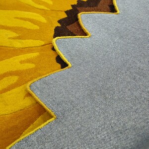 IN-108 Hand Tufted Sunflower Woolen Carpet for Floor Decor, Cozy Home,Bedroom, Courtyard, Living Room, Kids, Cabin, Bedroom, Reading Nook.
A vibrant sunflower-shaped wool rug handcrafted in rich yellow and brown tones, featuring realistic petal textures and a plush wool surface. Displayed in a bright minimalist room with indoor plants, natural sunlight, and a wooden bench, this handmade rug adds a cheerful botanical touch and cozy warmth to any modern living space.