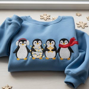 Christmas Penguin Embroidered Sweatshirt, Cute Penguin Scarf Lights Crewneck, Winter Holiday Animal Gift, Blue Xmas Shirt