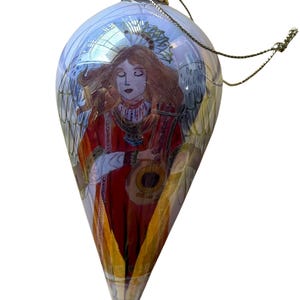 Reverse Painted Lavender, 5 inch Glass Tear Drop ANGEL ORNAMENT Hand Painted Strumming A small string instrument, Red Satin Box 2002