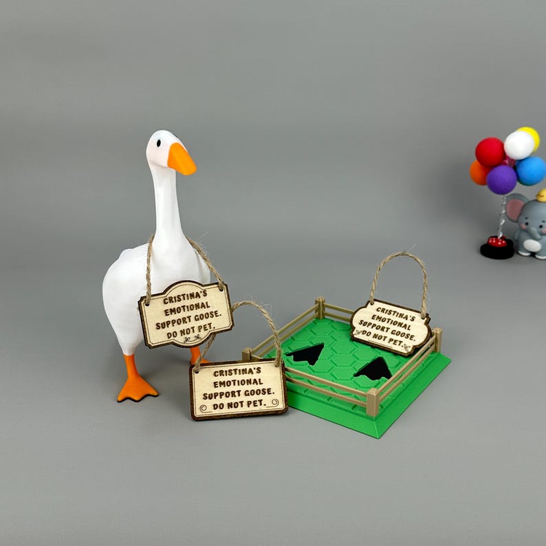 Funny emotional support goose desk figurine on faux grass base with customizable magnetic wooden sign – quirky office gift for coworkers and gamers.