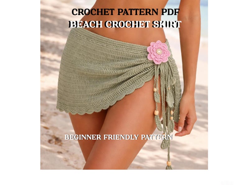 May include: A sage green crochet beach skirt with a scalloped edge and a pink flower accent. The skirt has fringe with wooden beads and the text "CROCHET PATTERN PDF BEACH CROCHET SKIRT BEGINNER FRIENDLY PATTERN".