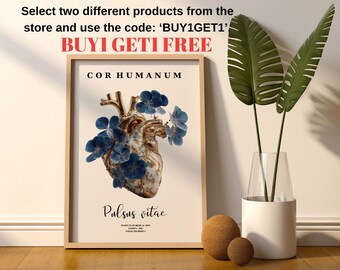 May include: A framed art print featuring a stylized anatomical heart adorned with blue floral accents. The print includes the Latin phrases "Cor Humanum" and "Pulsus vitae." The image also displays the text "BUY1 GET1 FREE".
