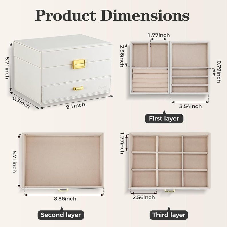 May include: A white jewellery box with gold-tone hardware, featuring three layers with various compartments. The exterior measures 9.1 inches by 6.3 inches by 5.71 inches. The interior layers include ring rolls, small dividers, and a large open storage area.
