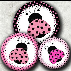 May include: Three pink and black polka dot ladybug themed round paper circles with white scalloped edges. The ladybugs have black spots and white accents.
