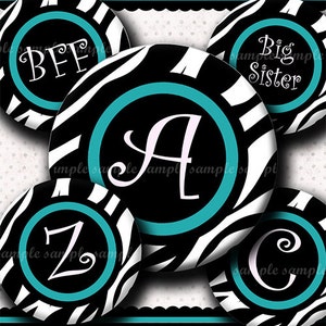 May include: Six round black and white zebra print stickers with a turquoise border and white lettering. The stickers feature the letters A, Z, C, and the words BFF and Big Sister.