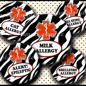 May include: Five round black and white zebra patterned stickers with a red medical symbol and text. The text reads: "BEE STING ALLERGY", "CAT ALLERGY", "ALERT! EPILEPTIC", "MILK ALLERGY", and "SHELLFISH ALLERGY".