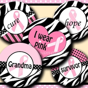 May include: Six pink and black zebra print round buttons with pink ribbons and text. The text on the buttons reads "cure", "hope", "I wear pink", "Grandma", "survivor".