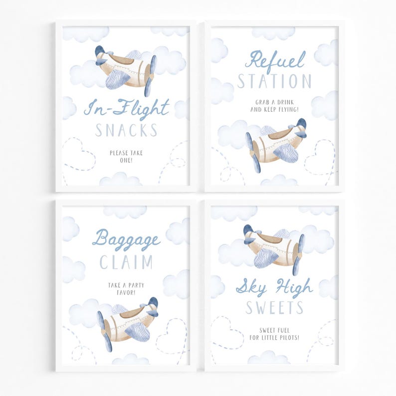 May include: Four framed prints with a watercolor airplane and cloud design. The prints have text that reads "In-Flight Snacks", "Refuel Station", "Baggage Claim", and "Sky High Sweets". The color scheme is white, blue, and tan.