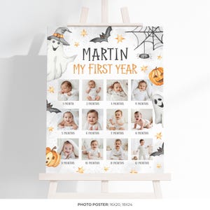 May include: A Halloween-themed photo poster featuring a baby's first year. The poster includes a grid of photos, a pumpkin, bats, a ghost, and the text "MARTIN MY FIRST YEAR". The poster is 16x20 inches.