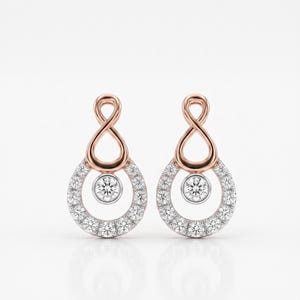 Pendientes colgantes Infinity Drop con diamantes y botones colgantes de oro rosa.