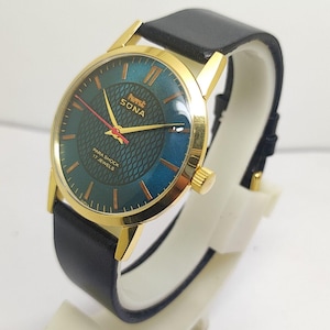 Montre mécanique vintage HMT Sona : cadran vert, 17 rubis, para-choc