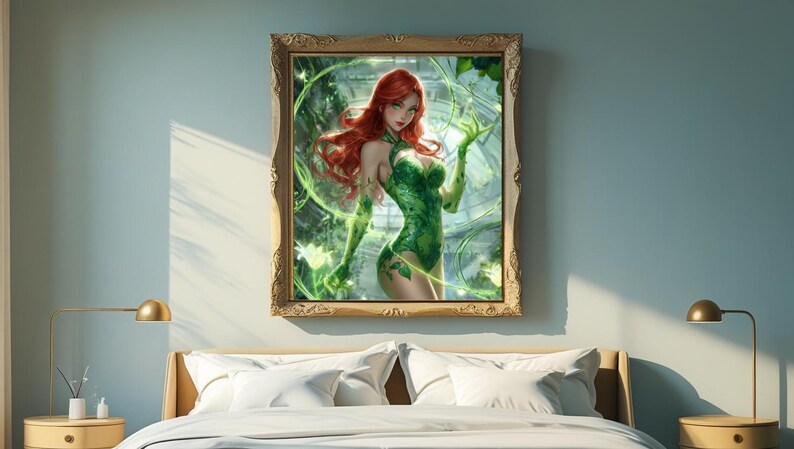 May include: A framed art print featuring a woman with red hair and a green costume, surrounded by green vines and glowing effects. The artwork is displayed in a bedroom setting, above a bed with white bedding.