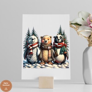 May include: A greeting card featuring three cartoon bears in a winter scene. The bears are wearing festive scarves and stand in front of snow-covered ground and evergreen trees. The card is displayed on a wooden stand.