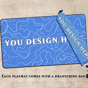 May include: A blue rectangular playmat with white squiggly lines and the text "YOU DESIGN HERE". A drawstring bag with the text "YOU DESIGN HERE" is attached. The text "EACH PLAYMAT COMES WITH A DRAWSTRING BAG" is at the bottom.