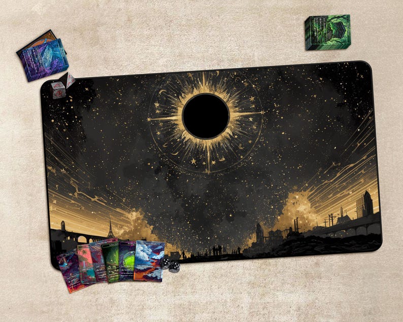 May include: A black and gold gaming mat featuring a celestial design with a central sunburst and a starry sky. The mat includes a cityscape silhouette at the bottom. Several card decks and dice are placed around the mat.