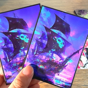 mtg pirate card sleeves With the 30th anniversary of Muppets Treasure Island, I got my first custom sleeve for my Ixalian deck : r/mtg crafted by a talented artist Fantasy North - Olivia Hughes