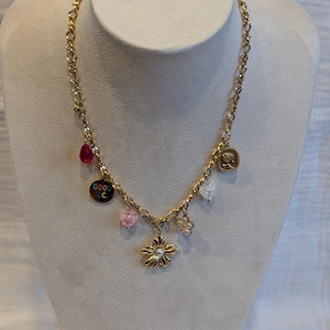 Gold-plated steel necklace with charms