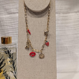 Gold-plated steel necklace with charms