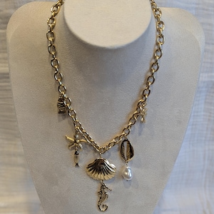 Gold-plated steel necklace with charms