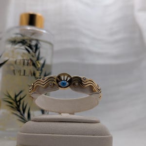 Gold-plated steel bangle bracelet